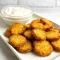 Golden brown Air Fryer Pickles served on a white plate with creamy ranch dip – the perfect Crispy Fried Pickles Snack for parties or easy weeknight munchies.