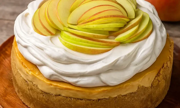 A tall, creamy Apple Cider Cheesecake Recipe topped with caramel drizzle and whipped cream, perfect for Cheesecake Fall Desserts and cozy gatherings. This dessert uses an Apple Cider Reduction for bold flavor, making it one of the Must Try Baking Recipes of the season. A twist on Apple Cider Pie, this smooth and spiced cheesecake is the ultimate Apple Spice Cheesecake for fall.