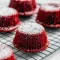 Overhead view of gooey Red Velvet Lava Cake cupcakes cut open to reveal melted chocolate center. Perfect Romantic Red Velvet Dessert for date nights, inspired by classic Lava Cake Recipes and Baked Dessert Recipes.