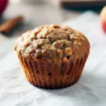 Golden apple-cinnamon oat muffins on a cooling rack, showing tender crumb and oat topping — a simple take on Heart Healthy Apple Recipes, perfect Easy Muffins Healthy to batch bake, and a smart option in Healthy Food Ideas Low Carb collections.