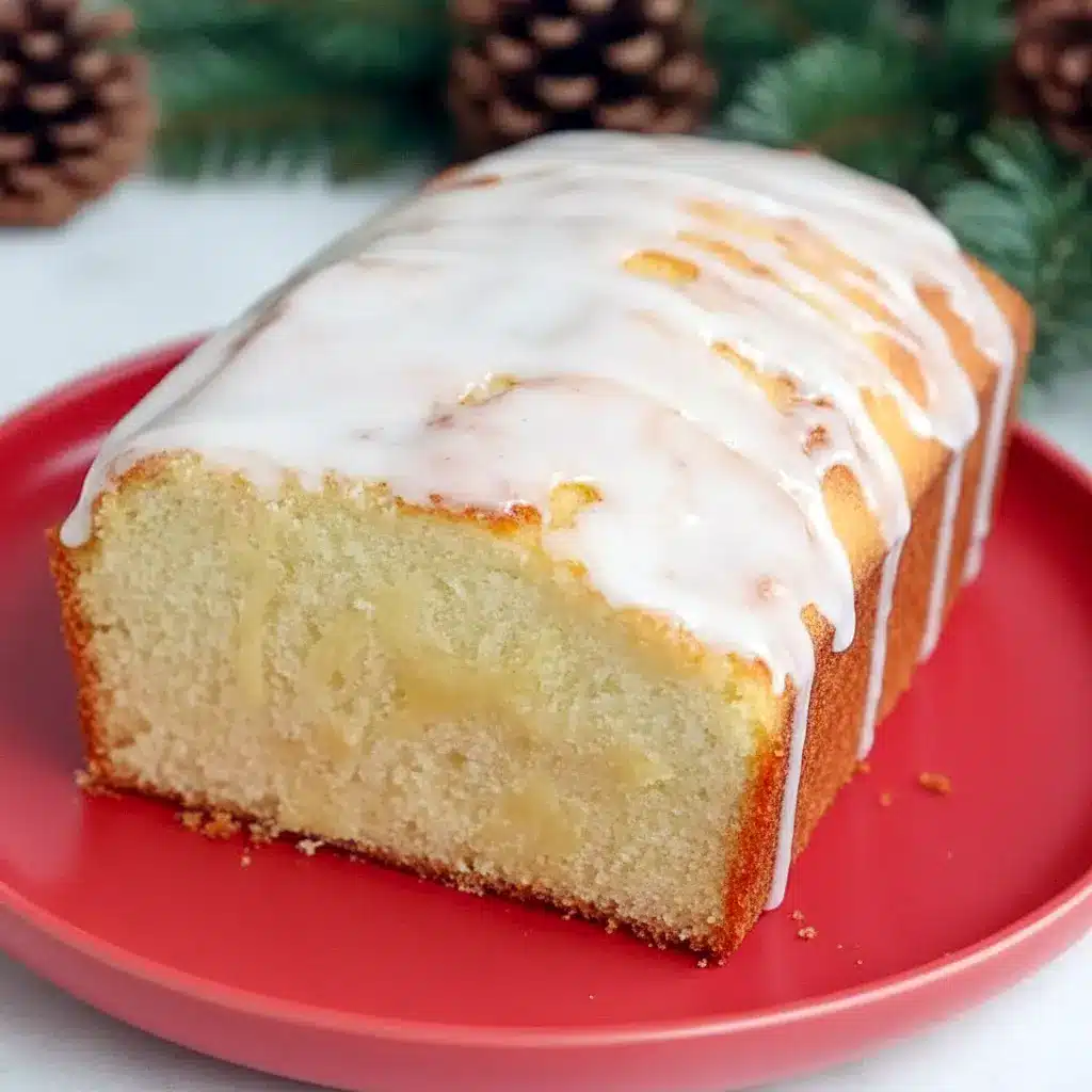 Close-up of a rum-glazed holiday loaf on a wire rack: a moist Eggnog Quick Bread that smells like Christmas Eggnog, ideal as an Eggnog Bread Recipe or adapted into an Eggnog Bread Recipe With Yeast for a chewier bite, Eggnog Bread With Rum Glaze.