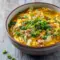 Steaming bowl of egg roll soup with ground pork, shredded cabbage, green onions, and ginger — a simple One Pot Healthy Dinner and an inviting example of Hearty Healthy Soups.