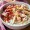 Chicken Bacon Ranch Cottage Cheese Bowl in a white bowl topped with shredded chicken, chopped bacon, and herbs — a cozy Macro-Friendly Dinner close-up.
