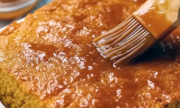 Slice of golden Sweet Potato Cornbread on a wooden board, glazed and ready — a top Quick Potato Side Dishes pick for cozy dinners.