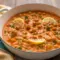 Indian Butter Chickpeas — creamy tomato-spice sauce with tender chickpeas, garnished with cilantro and lemon, served with naan for a cozy Easy Cooking Vegetarian meal.