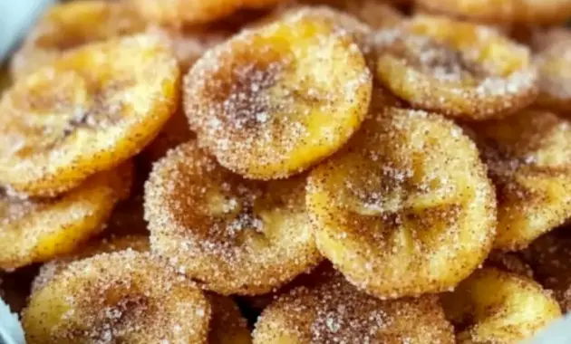 Golden, cinnamon-dusted Air Fryer Banana Chips piled on parchment, crisp and ready to eat — a tasty Healthy Snacks Teenagers will reach for.