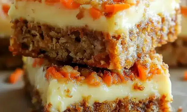 A tray of Peanut Butter Blondies styled as Carrot Cake Bars With Cream Cheese, with a soft swirl and Easter-inspired presentation.