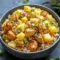 A skillet of Pineapple Chicken and Rice with juicy pineapple, tender chicken, red bell pepper, green onions, and sesame seeds for a colorful one-pan dinner.