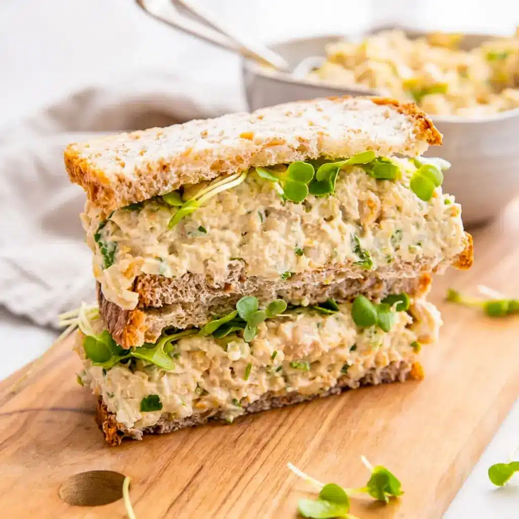 Chickpea Salad Sandwich highlights Chickpea Salad Sandwich Ingredients like chickpeas, celery, onion, parsley, mustard, and vegan mayo.