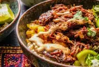 Crockpot Chipotle Pineapple Pot Roast Bowl with tender shredded beef, a sweet and smoky Pineapple Pot Roast flavor, and a rice base.