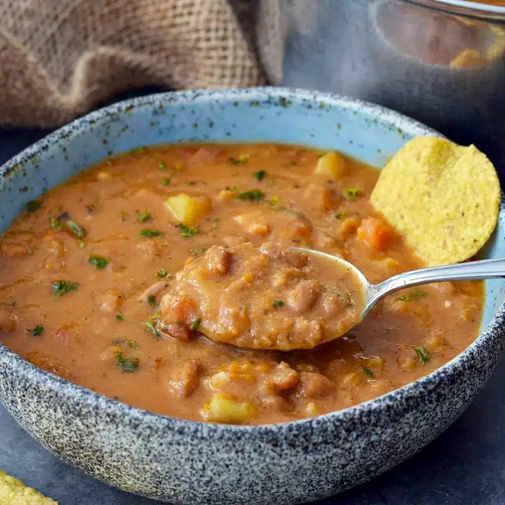 Mexican Pinto Bean Soup topped with fresh herbs and lime, a satisfying Mexican Soup Vegetarian recipe with bold flavor.